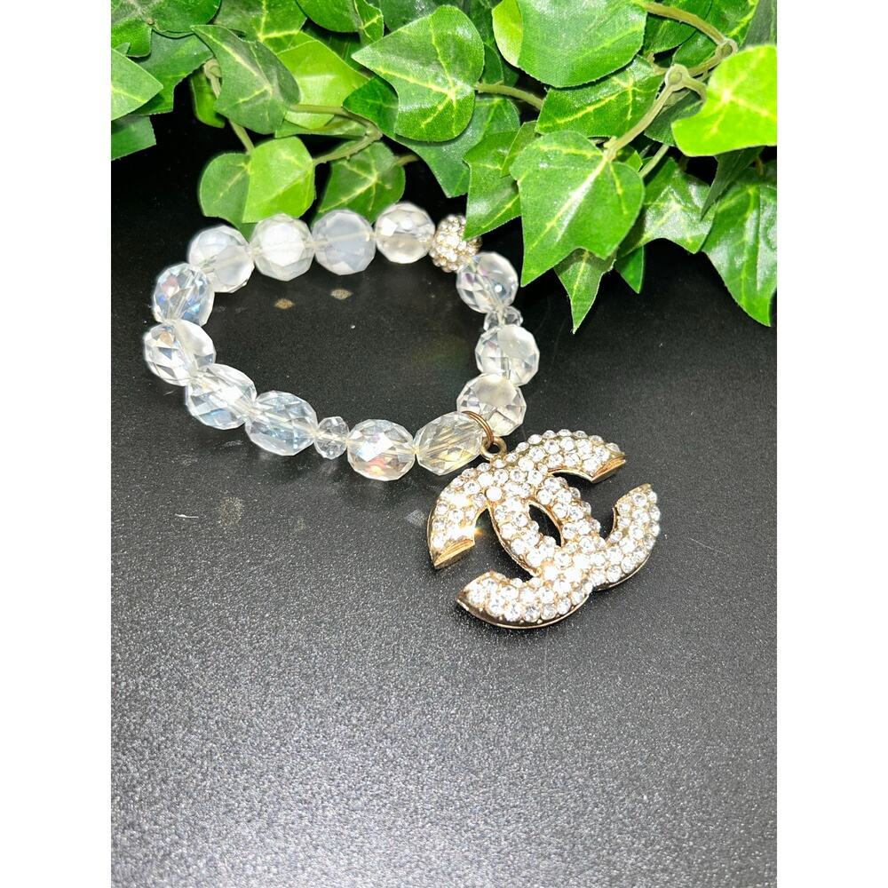 Chanel Iridescent AB Beaded Bracelet Crystal CC Logo Crescent Charm Gold Tone